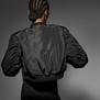 The reverse of the NAOMI In Fashion cropped bomber jacket by BOSS features Naomi Campbell's signature in a subtle black-on-black embroidered stitch